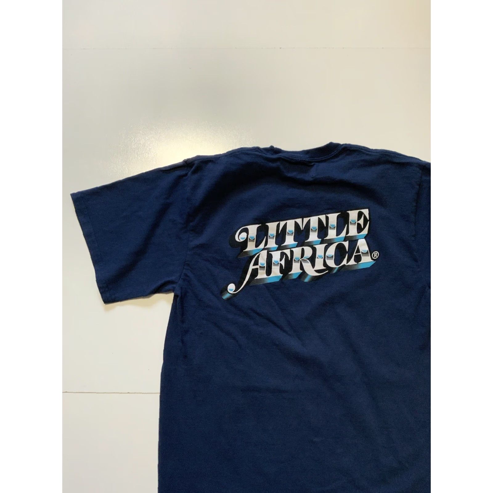 Vintage LITTLE AFRICA Soul Made Global Navy Crewneck 2 Sided Graphic S/S T-Shirt Sz. M Men Crew Neck Blue Navy T-Shirt M Mens Size US M / EU 48-50 / 2 - 4 Thumbnail