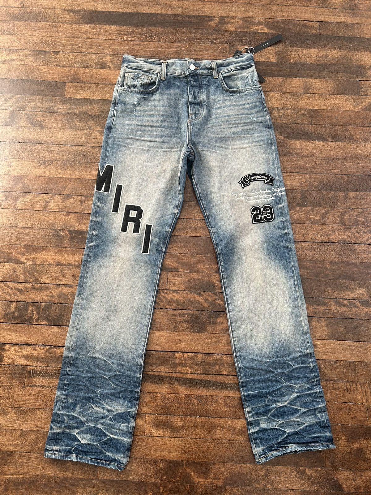 image of Amiri Chenille Logo Denim in Blue, Men's (Size 30)