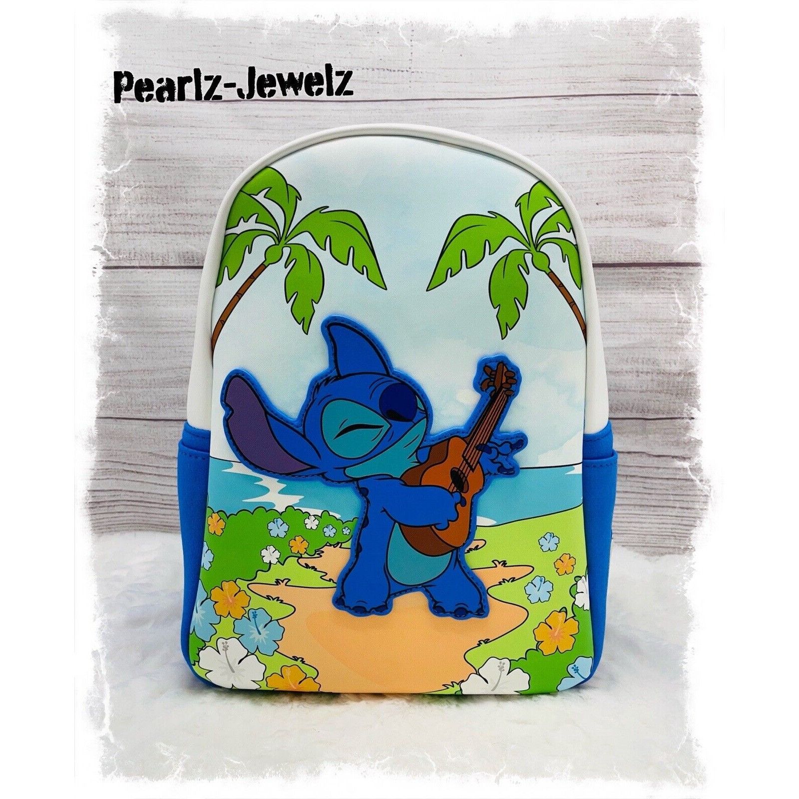 image of Loungefly Disney Lilo & Stitch King Ukulele Mini Backpack Bo in Blue, Women's