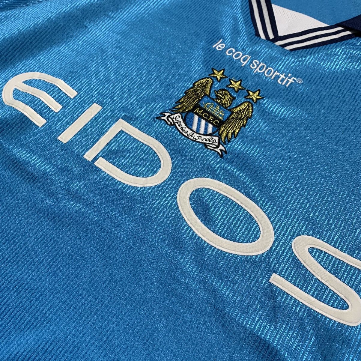 Le Coq Sportif Vtg 90s Le Coq Sportif Manchester City 'EIDOS' Home Jerseys Size US M / EU 48-50 / 2 - 8 Thumbnail