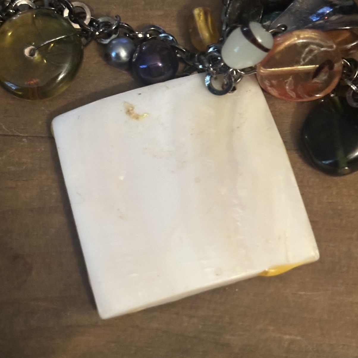 Other Dark silver tone mother of pearl pendant and charms necklace Size ONE SIZE - 7 Thumbnail