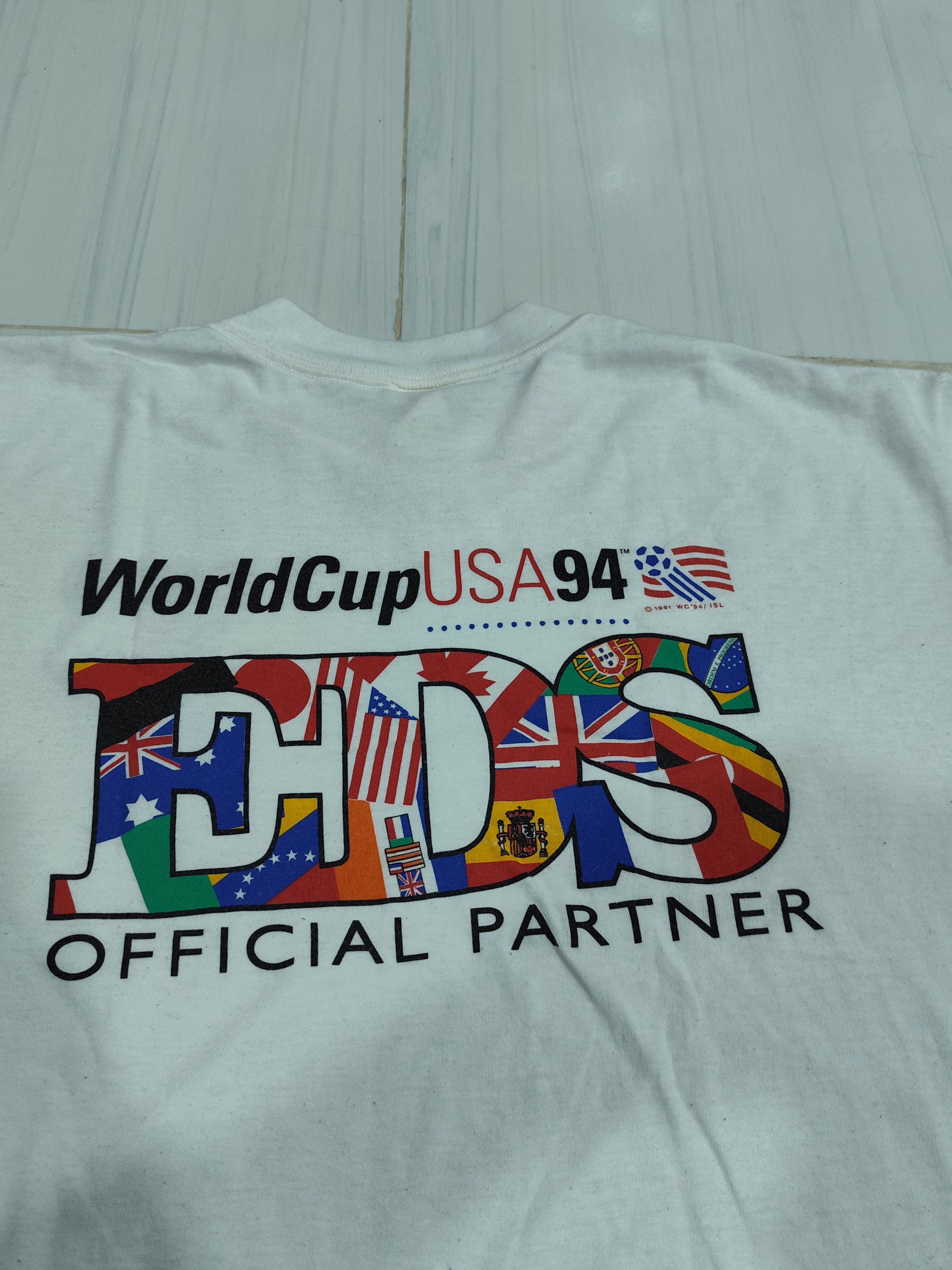 Vintage Vintage 1994 world cup EDS Size US L / EU 52-54 / 3 - 6 Thumbnail