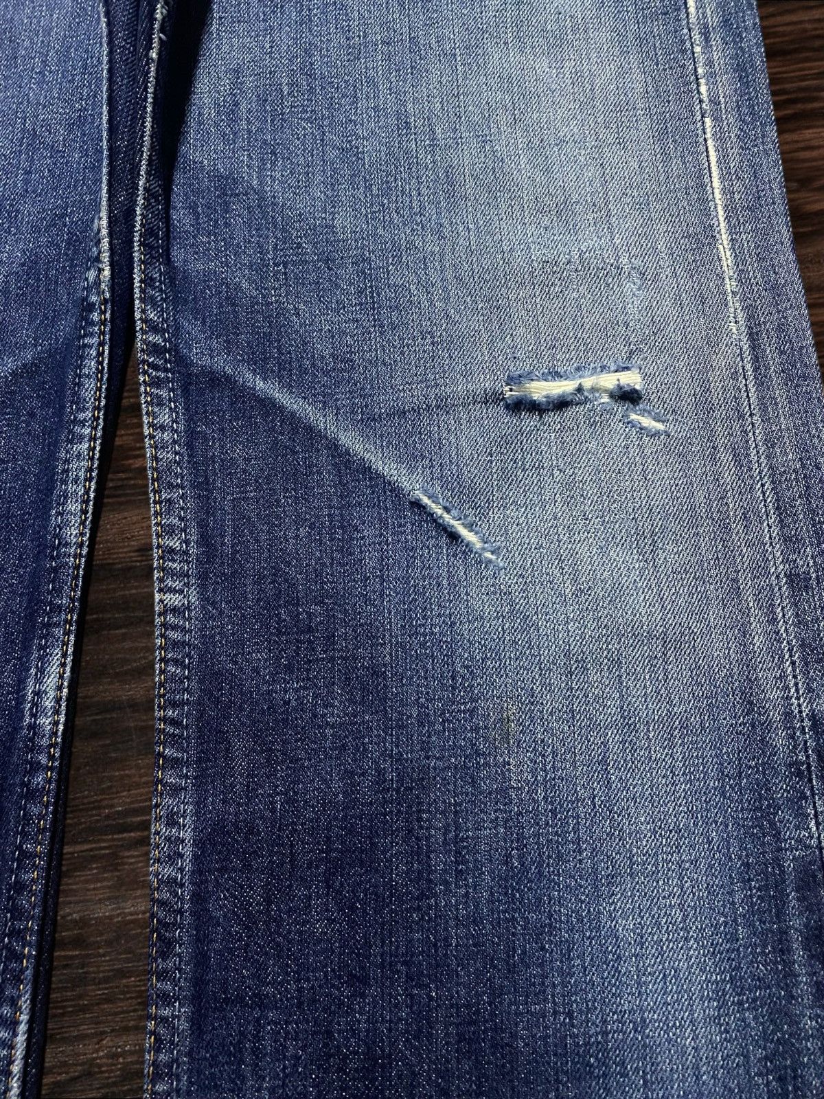 Levi's Vintage Clothing Levi's 501 blue jeans with a worn, distressed look jeans Size US 29 - 8 Thumbnail