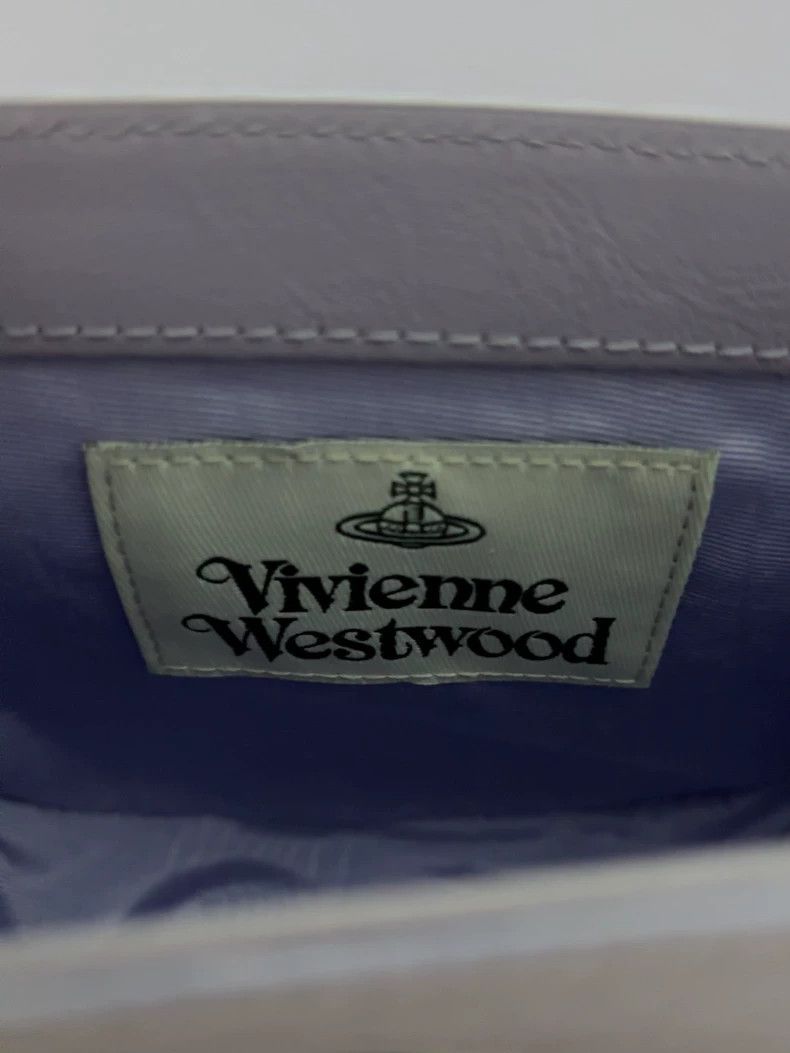 Vivienne Westwood Vivienne Westwood size os Purple water ripple brass Saturn Size ONE SIZE - 6 Thumbnail