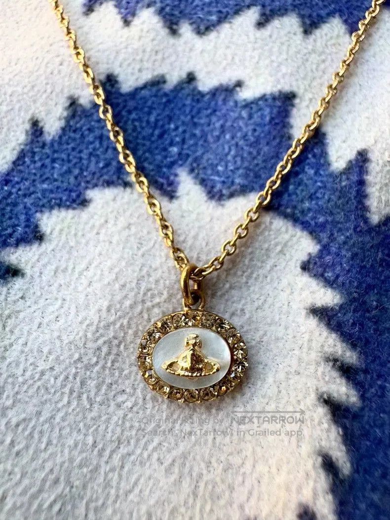 Vivienne Westwood Mother of Pearl Saturn Necklace.