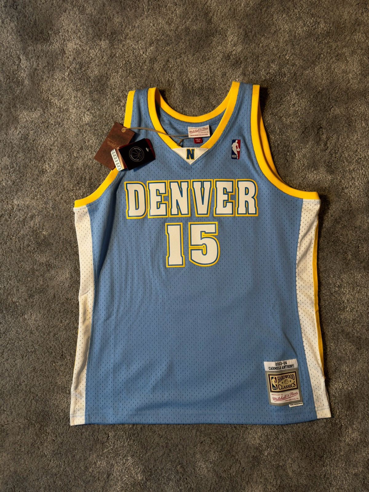 image of Mitchell Ness x NBA Carmelo Anthony 2003-2004 Denver Nuggets Jersey in Blue, Men's (Size Medium)