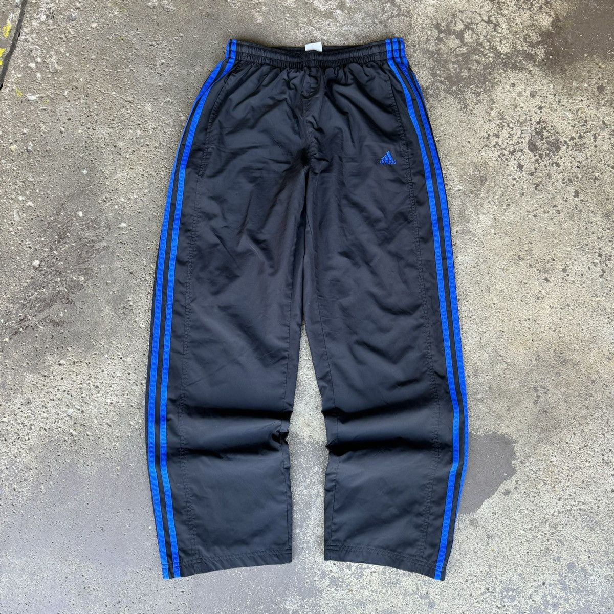 Adidas BAGGY VINTAGE ADIDAS BLACK/BLUE ESSENTIAL TRACK PANTS Grailed