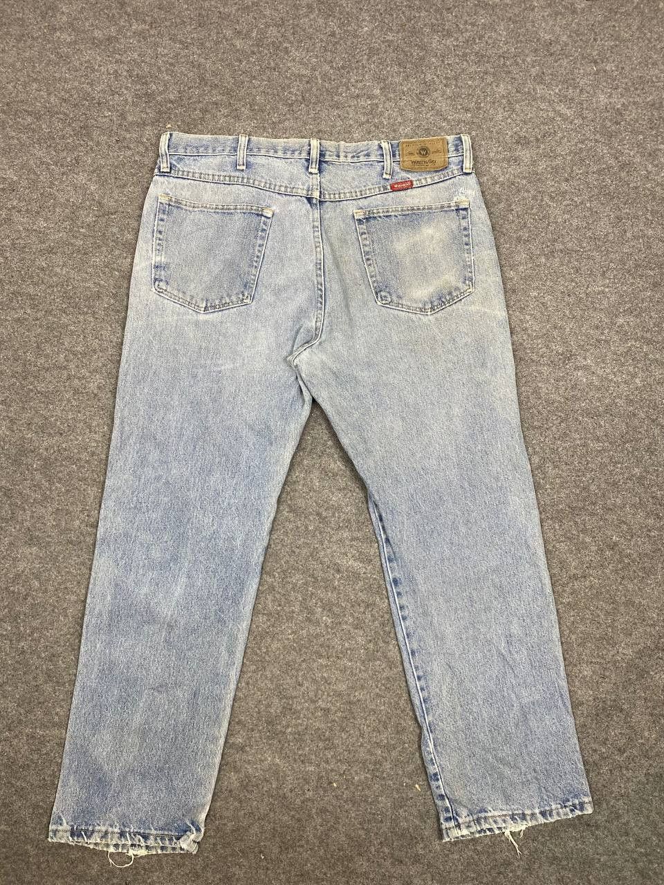 image of Wrangler Relaxed Fit Distressed Denim in Light Blue, Men's (Size 37)