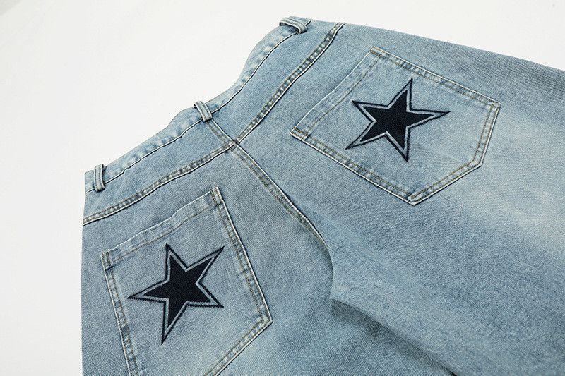 Vintage star embroidered distressed washed curved jeans