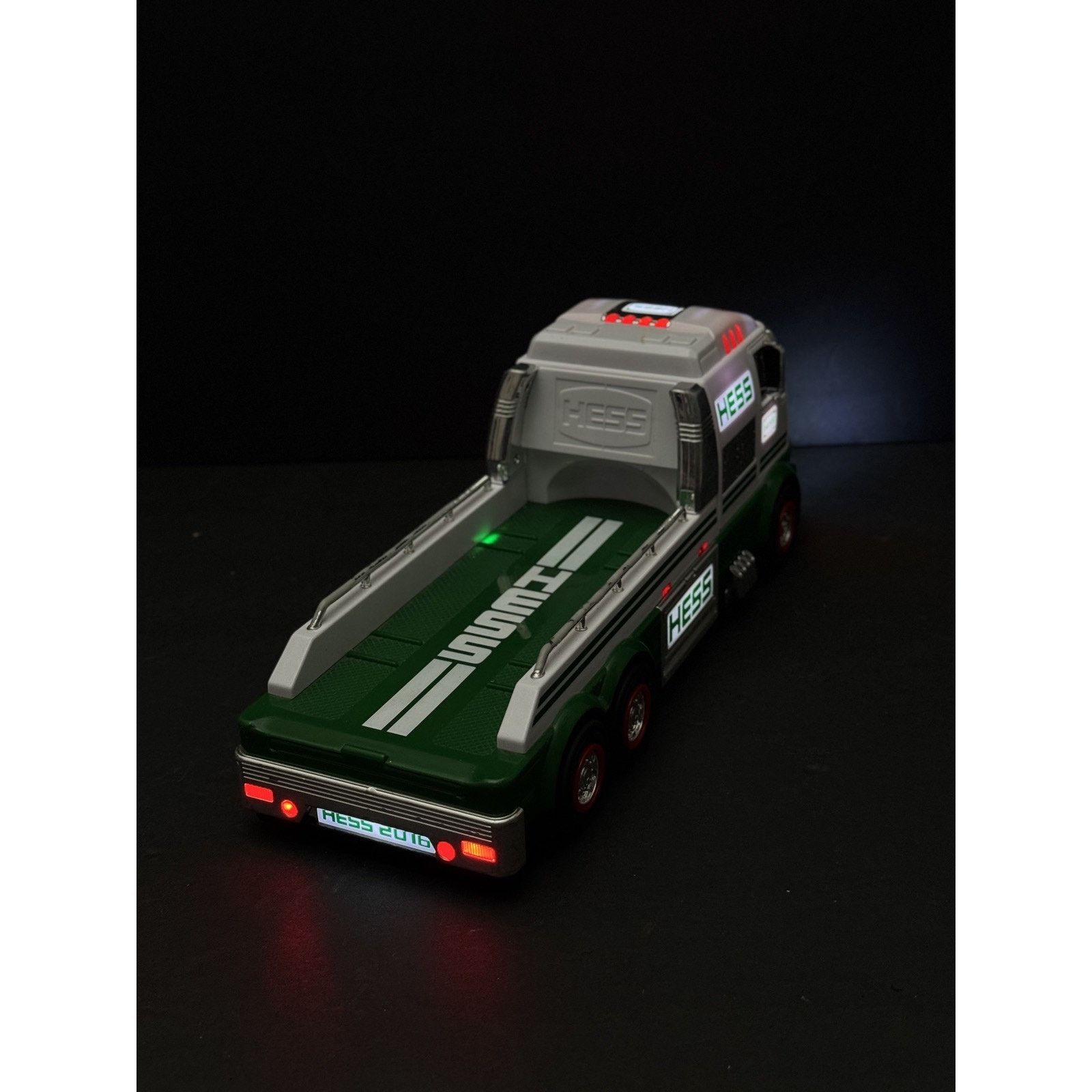 & Other Stories HESS 2016 COLLECTIBLE FLAT BED TRUCK HAULER lights & sounds Size ONE SIZE - 4 Thumbnail