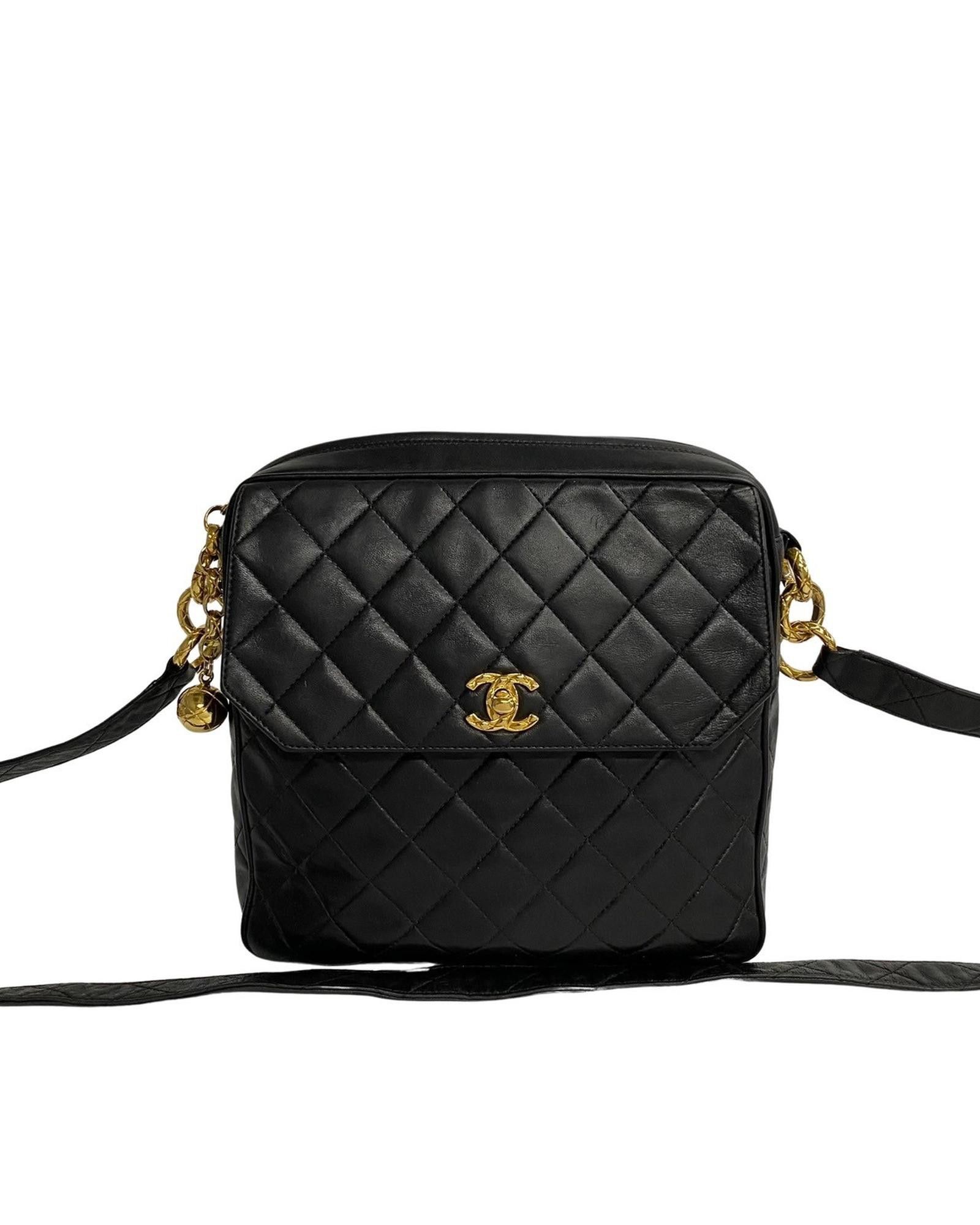image of Chanel Quilted Leather Messenger Bag in Black, Women's