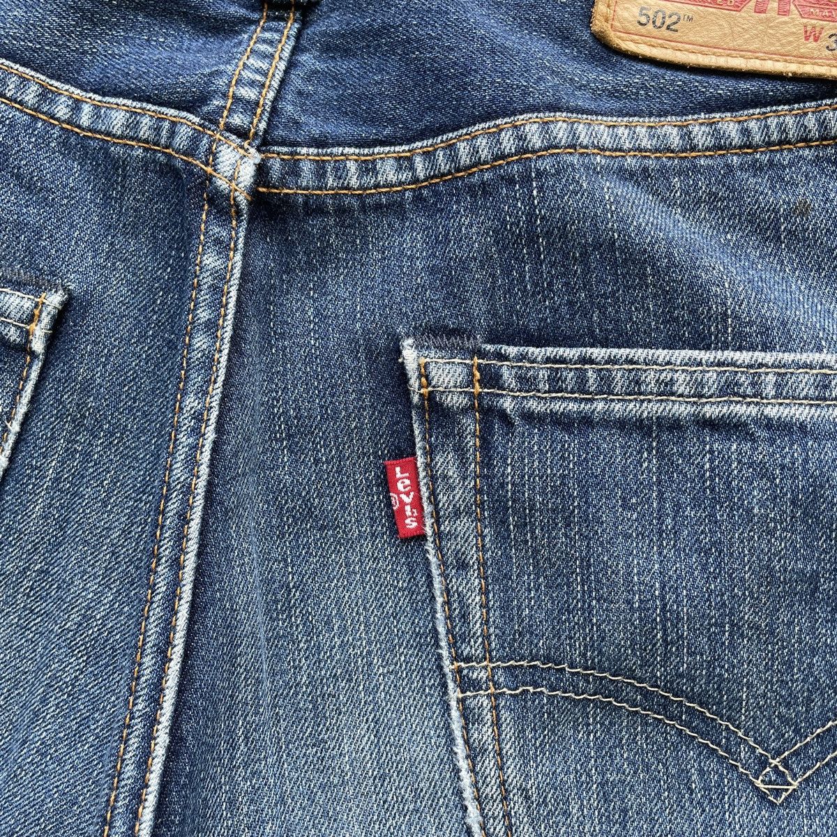 Jean × Levi's Levi’s 502 Faded Blue Distressed Jeans Denim Pants W32x29 Size US 32 / EU 48 - 8 Thumbnail