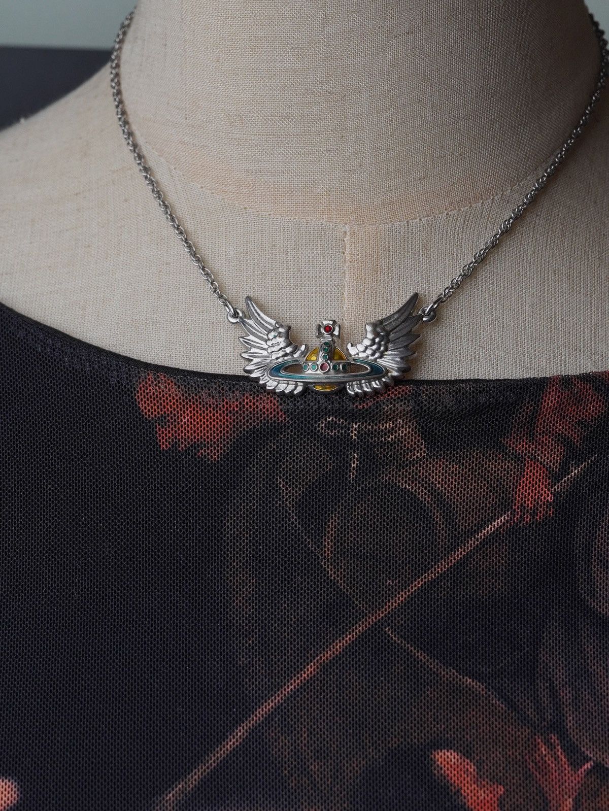 Vivienne westwood angel wing necklace hotsell