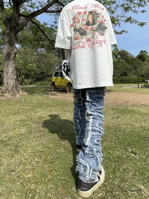 ripped fade flare damaged jeans