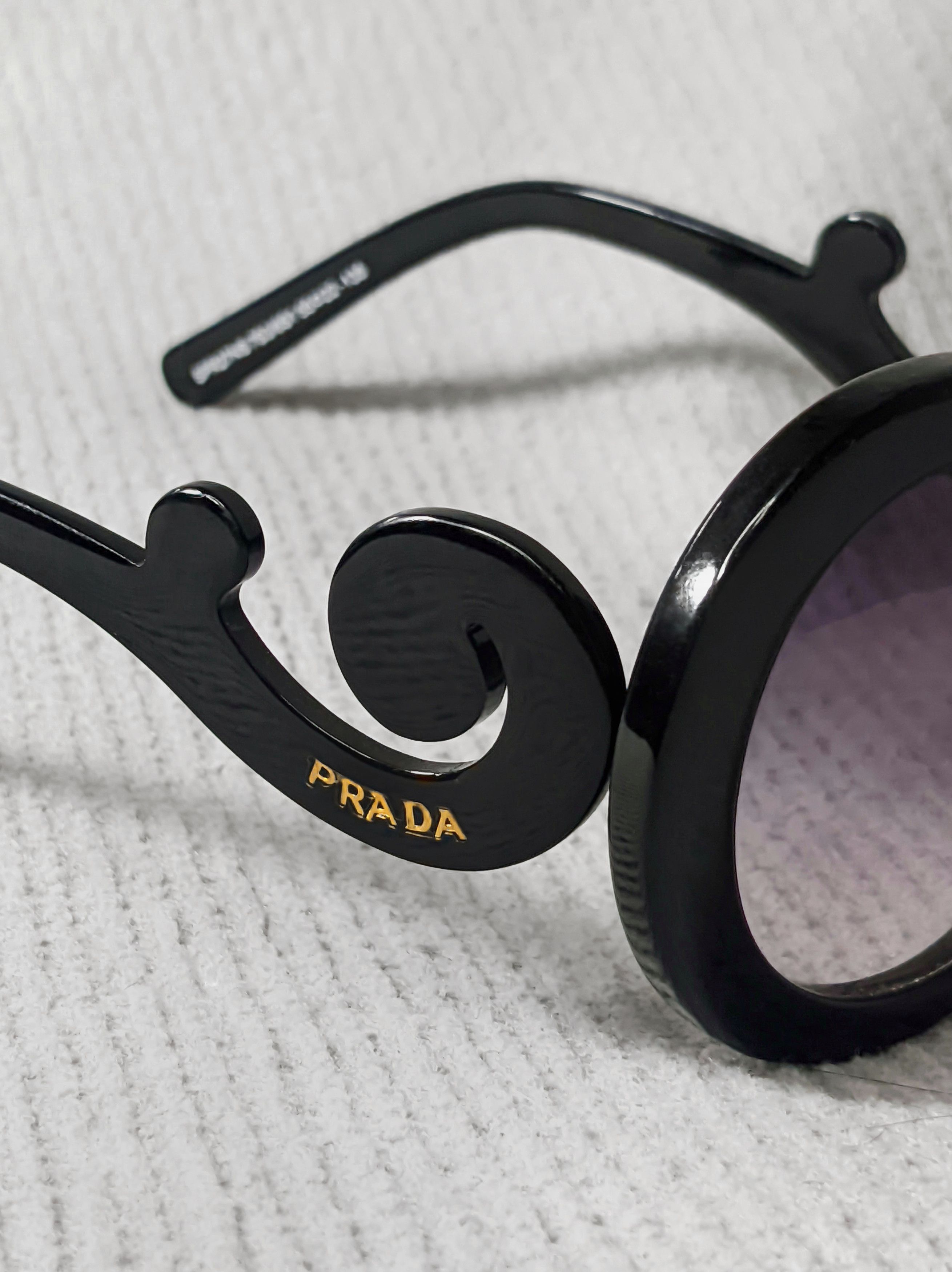 Prada Baroque Swirl Round Black Sunglasses