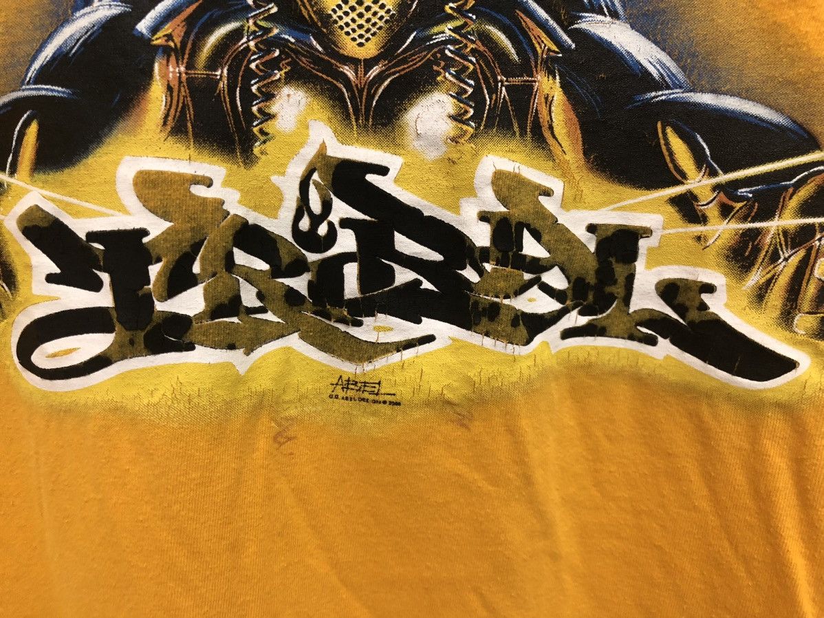 Tribal Streetwear × Vintage Y2K 🔥 TRIBAL USA ABEL CYBERPUNK MECHA ROBOT ART TEE RARE Size US L / EU 52-54 / 3 - 10 Thumbnail
