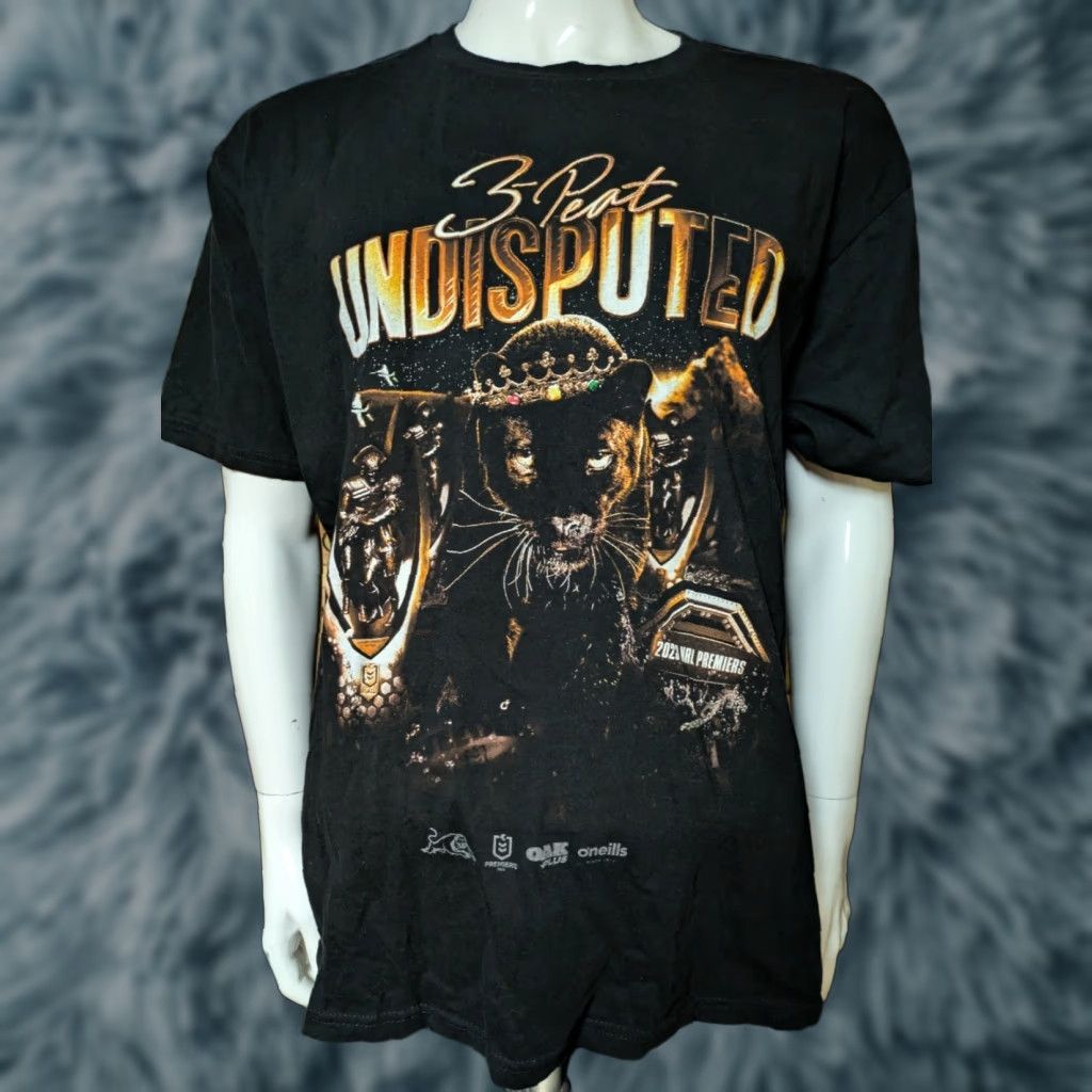 Vintage VINTAGE Penrith Panthers 3 Peat Undisputed NRL Premiers T Shirt 2XL XXL Black Mens Short Sleeve Crew Neck Sportage 100% Cotton Shirt NRL 3 Peat Size US XXL / EU 58 / 5 - 1 Thumbnail