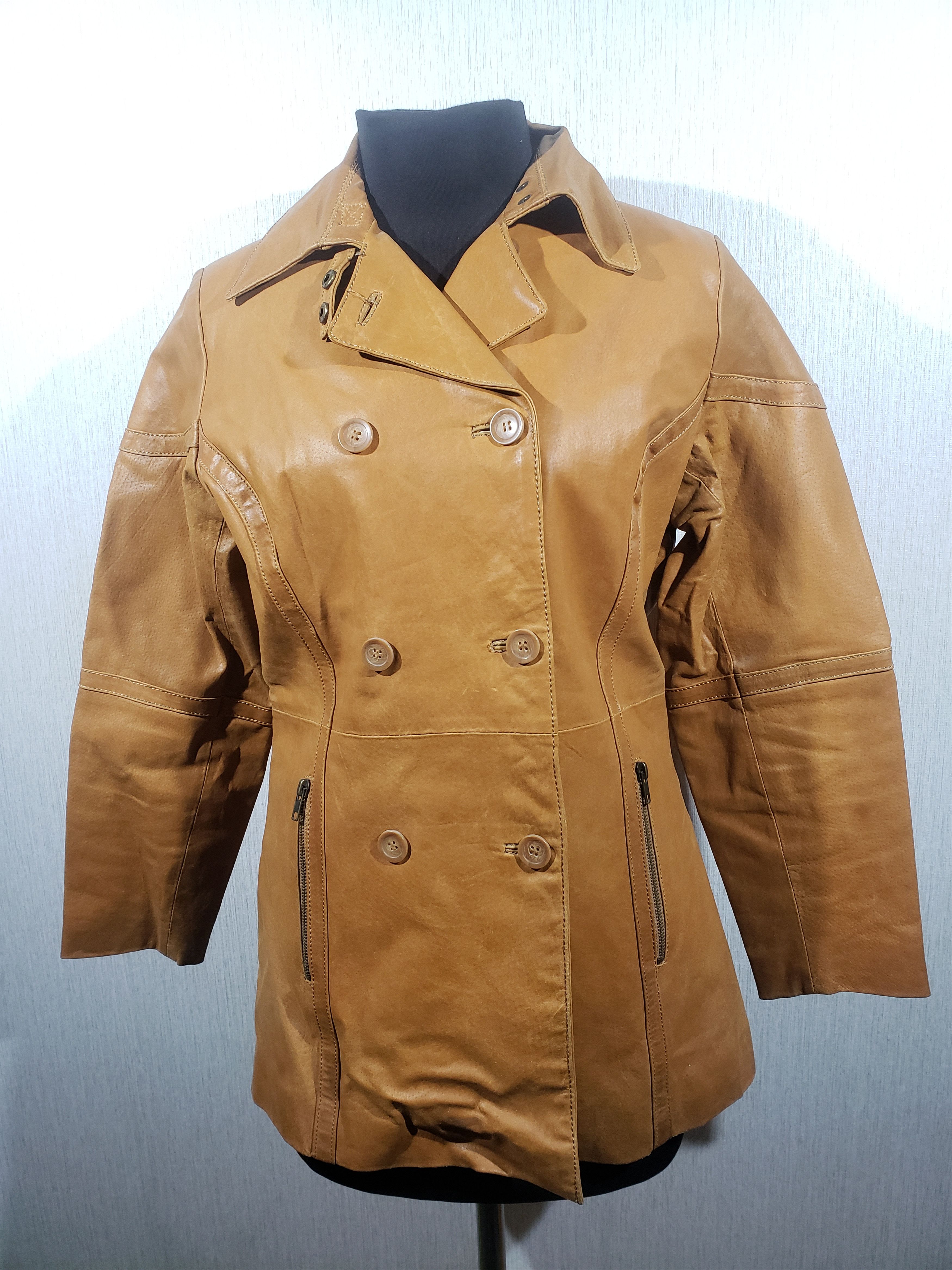 Stylish brown leather jacket for women.