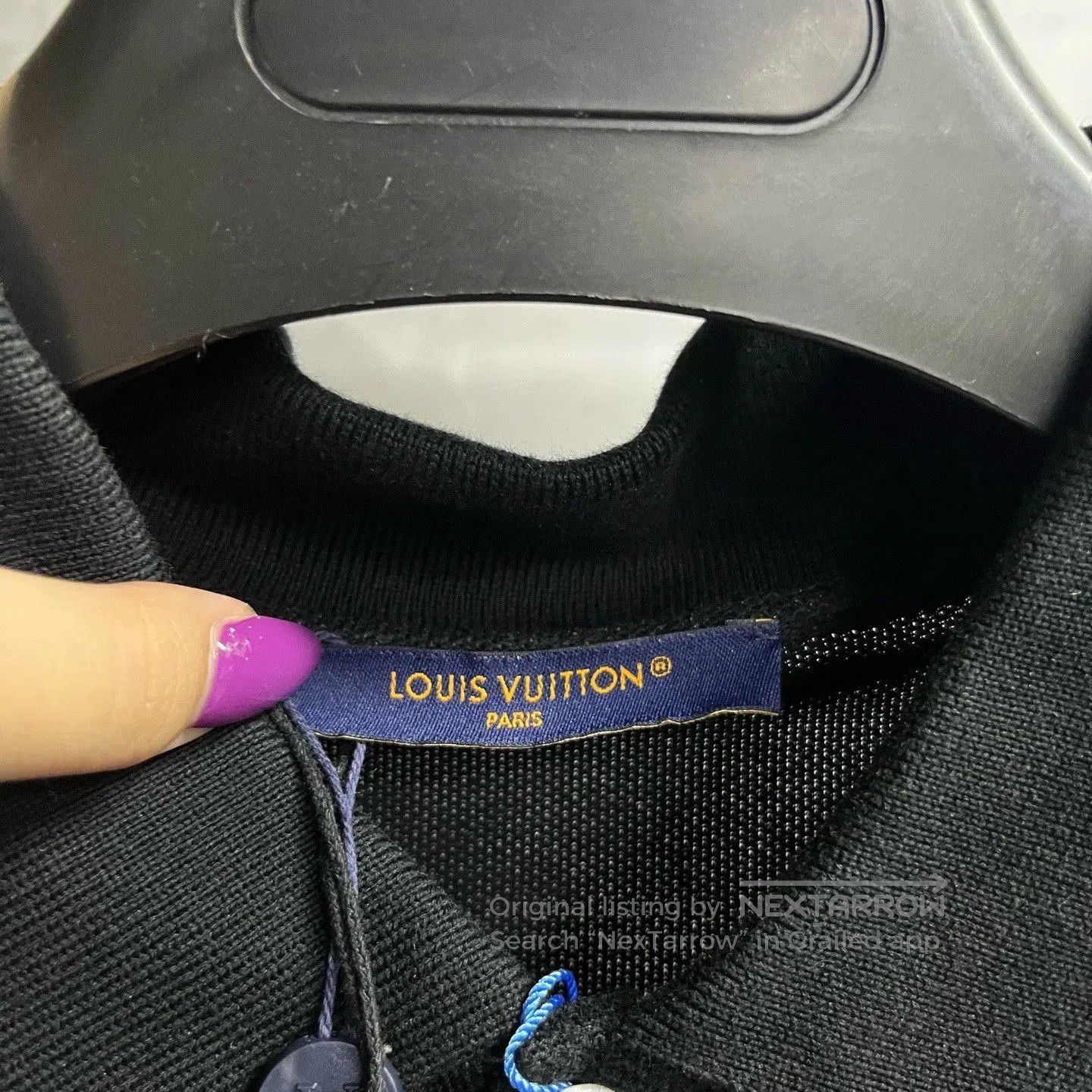 black louis vuitton embroidered logo polo shirt.