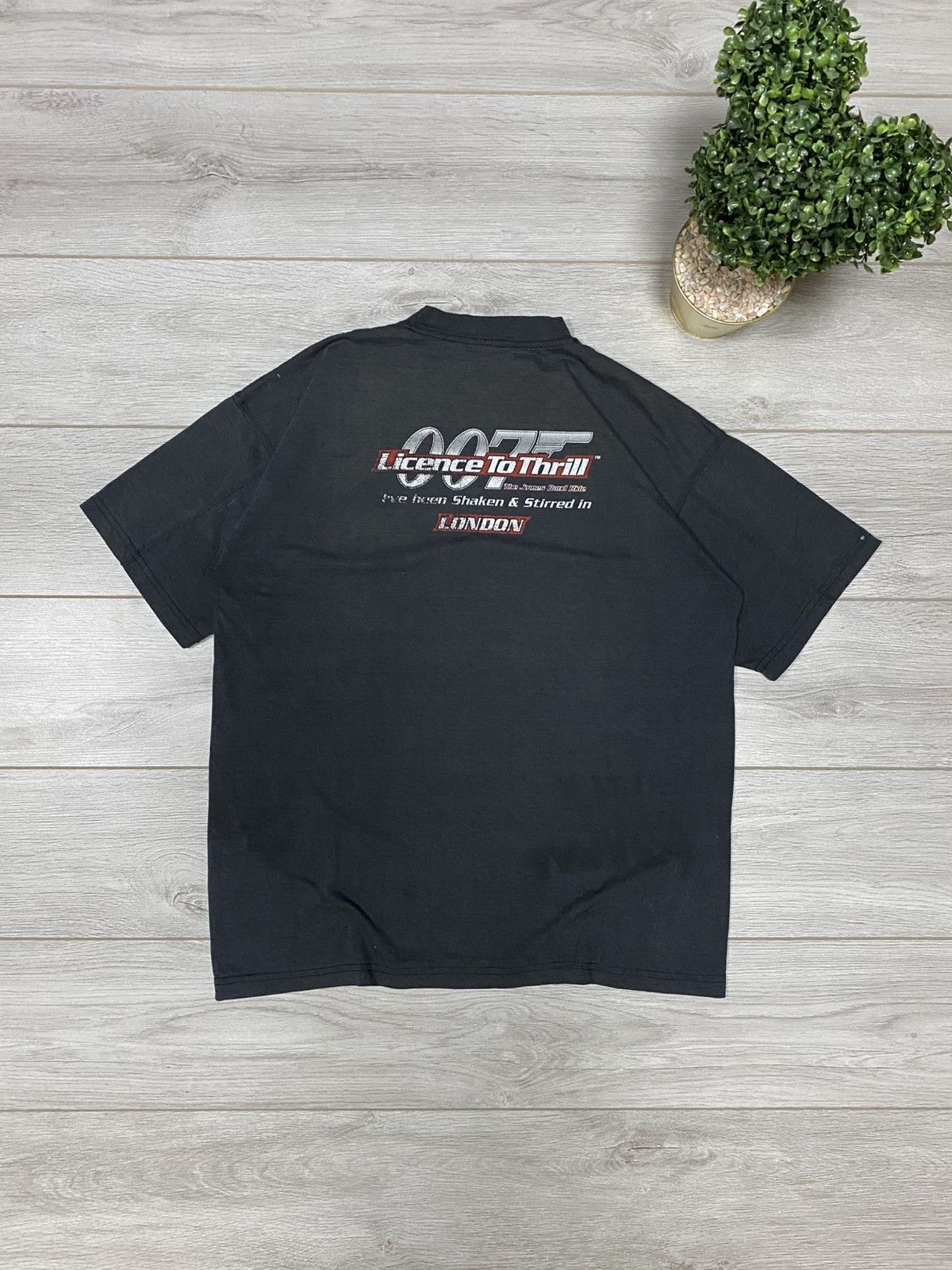 Vintage Vintage 1997 James Bond 007 faded Tomorrow Never Dies Tee Size US XL / EU 56 / 4 - 1 Thumbnail