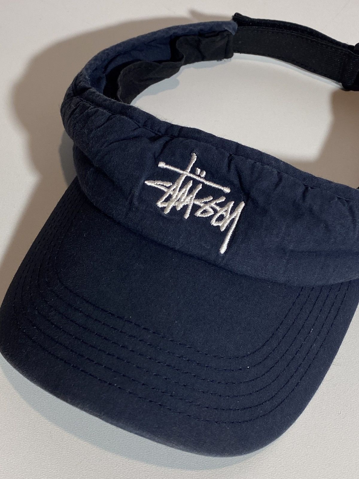 Vintage Vintage 90s Stussy Navy Embroidered logo visor cap | Grailed