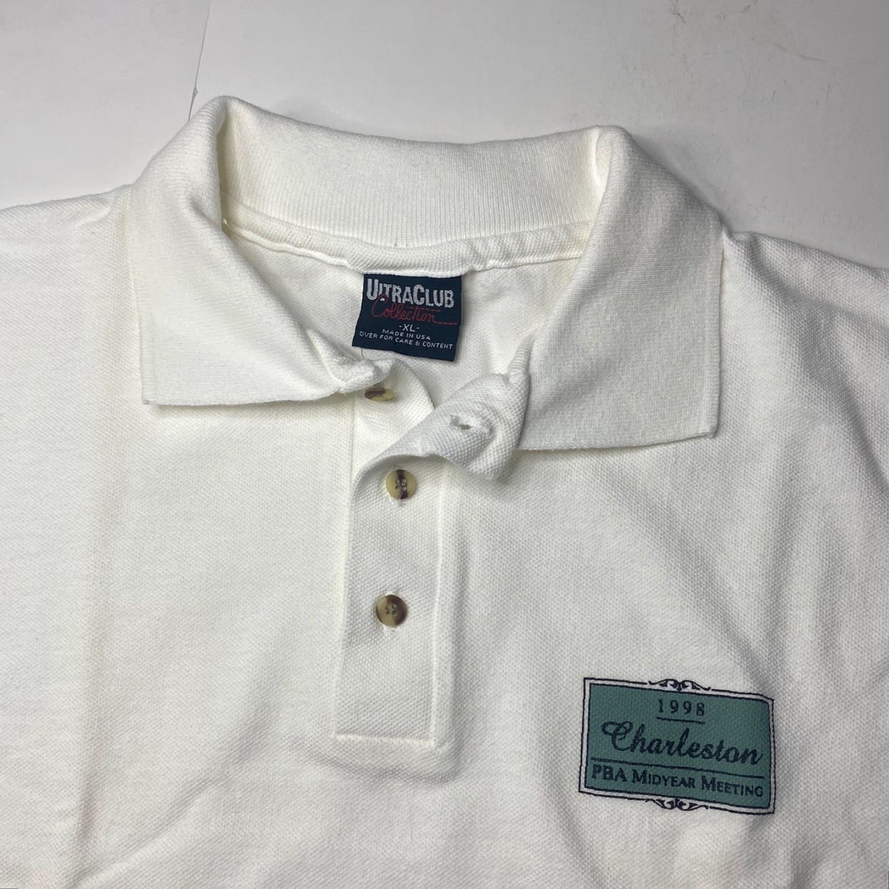 Vintage VINTAGE Ultra Club Collection Polo Shirt XL White 1990s 1998 PBA Mid Year Meeting Made in USA Mens Polo Rugby Short Sleeve Sportswear/Beach Size US XL / EU 56 / 4 - 4 Thumbnail