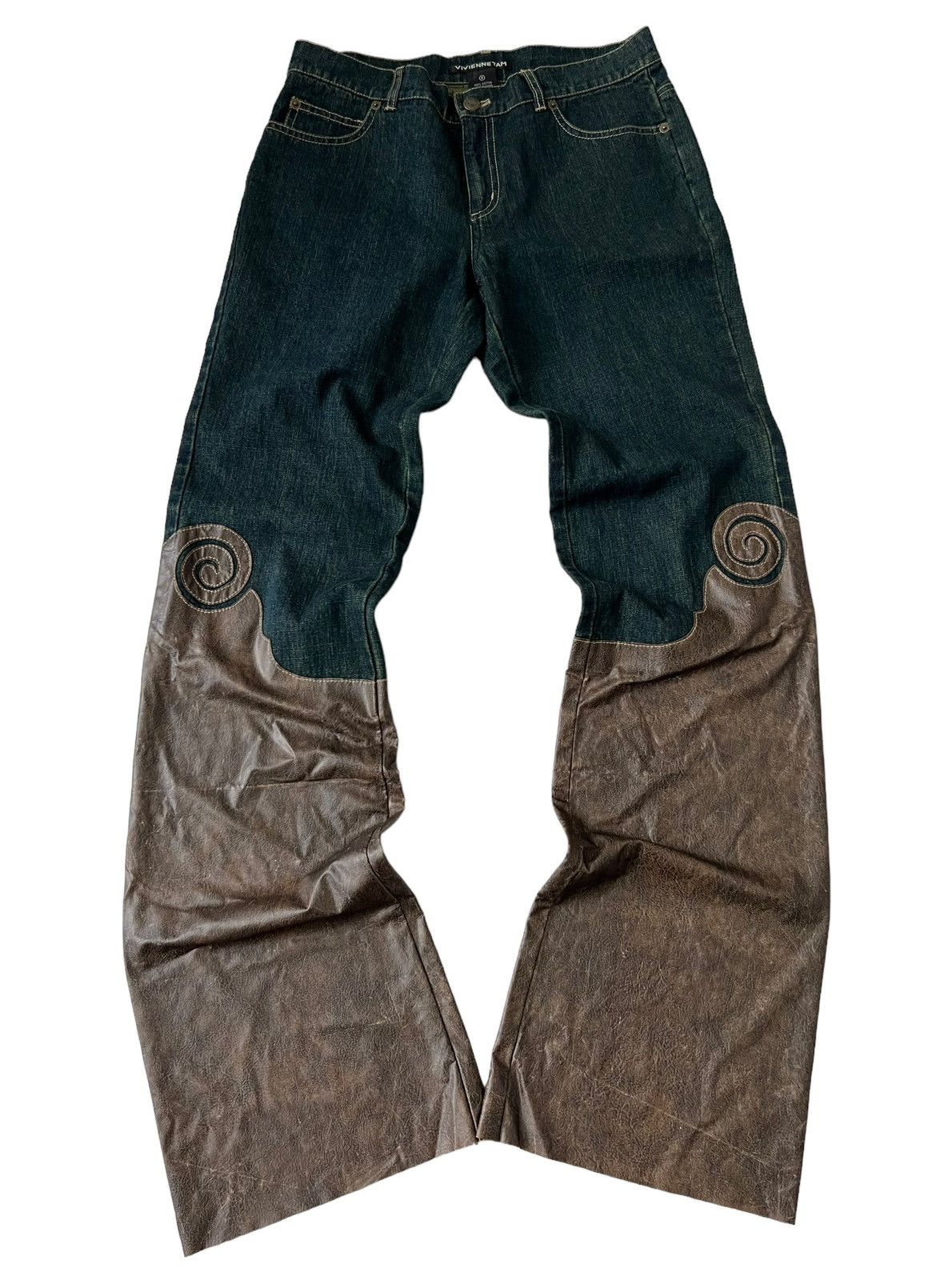 image of Archival Clothing x Vivienne Tam Flared Jeans Tribal Swirl Leather Patch Detail in Blue/Brown, Wome