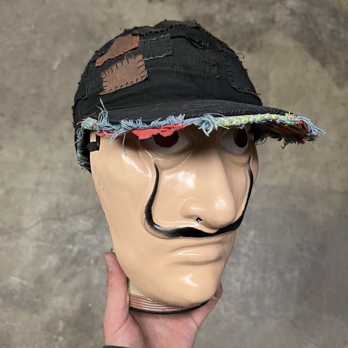 image of Undercover Ss03 “Scab” Patchwork Hat in Black, Men's