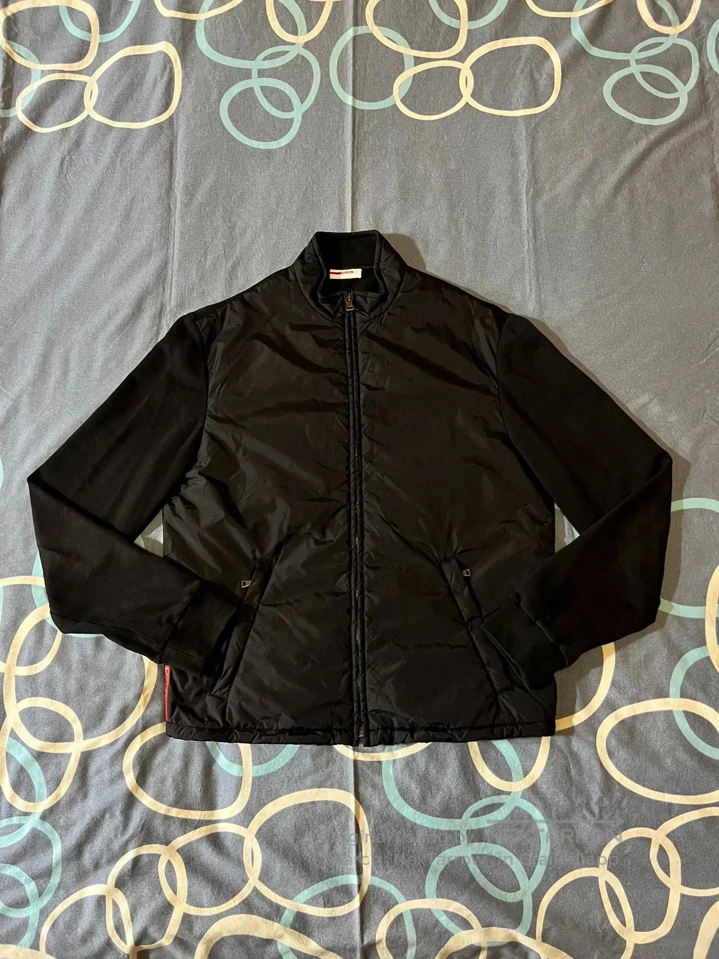 prada classic red logo zip-up jacket.