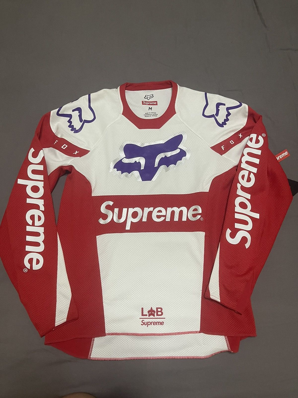 Supreme moto Wire jersey hotsell emblem