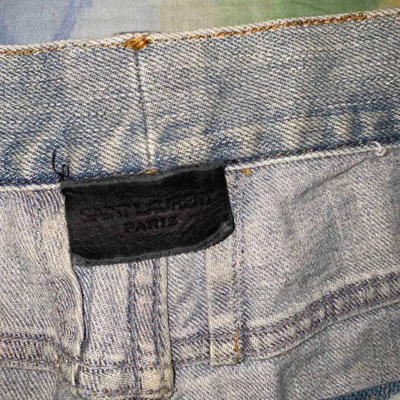 Saint Laurent Paris Saint Laurent Paris Wash cut hole ice blue denim pants siz Size US 33 - 3 Thumbnail