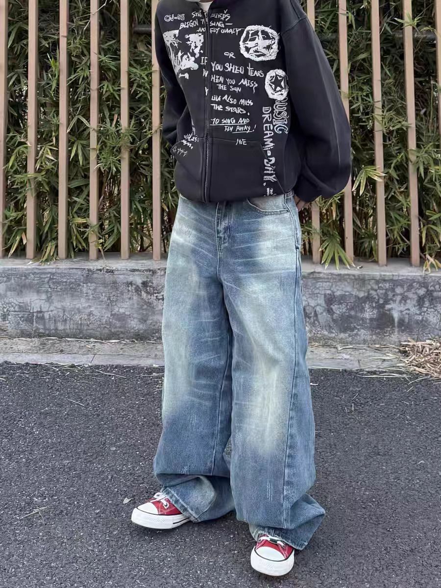 Washed and whitened creased vintage baggy jeans