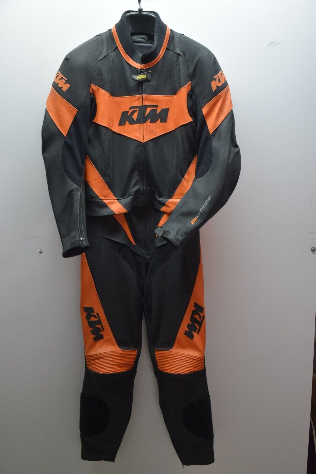 image of Ktm Leather Motorcycle Racing Suit in Black/Orange, Men's (Size Large)