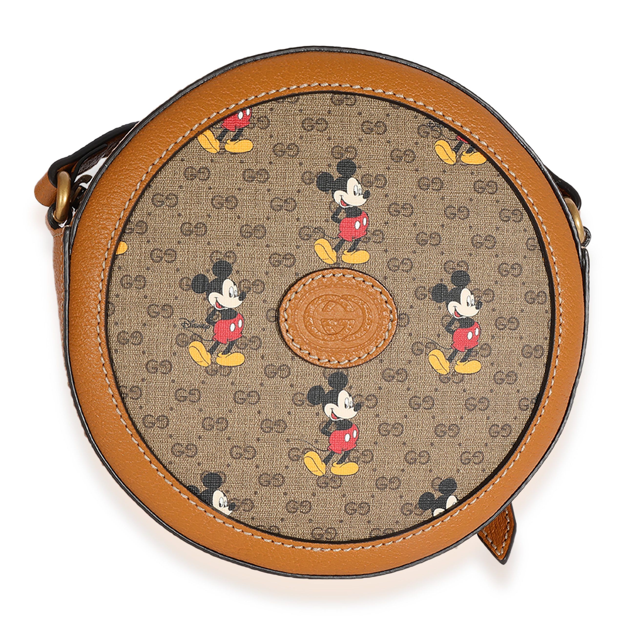 image of Gucci X Disney Vintage GG Supreme Mickey Mouse Mini Round Bag in Brown, Women's