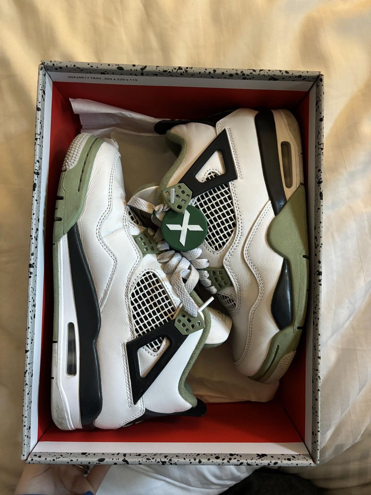 image of Nike Jordan 4 Oil Green Shoes in White, Women's (Size 7)