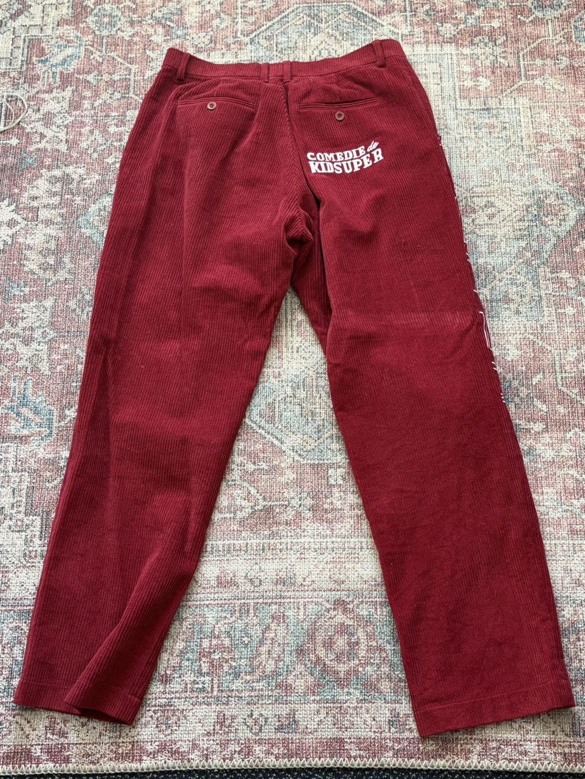 comedie de KidSuper Red Embroidered cotton trousers