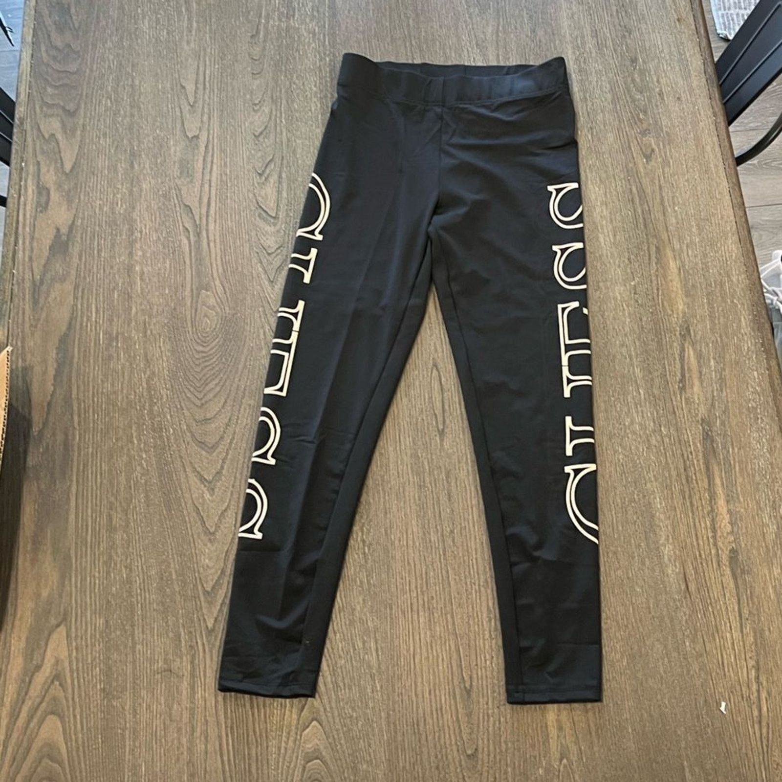 Guess NWOT Guess Black Cropped Capri Leggings Logo Print Size S Size 26" / US 2 / IT 38 - 4 Thumbnail