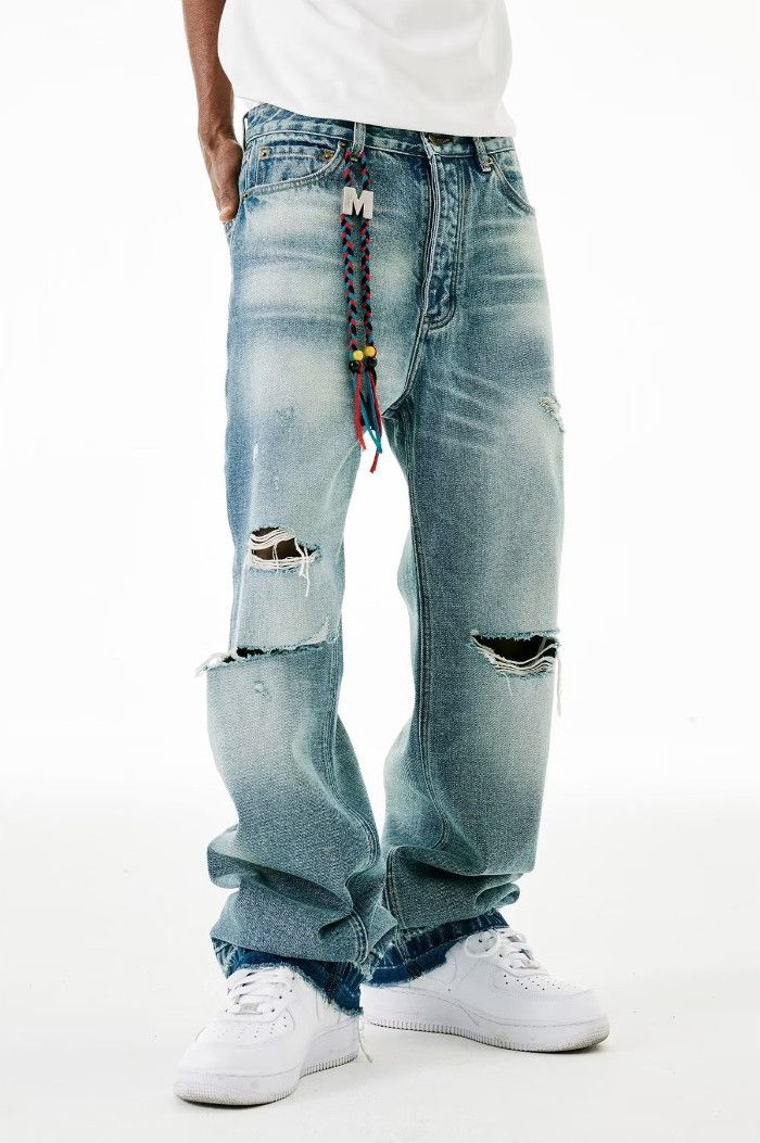 Vintage washed ripped bootcut jeans