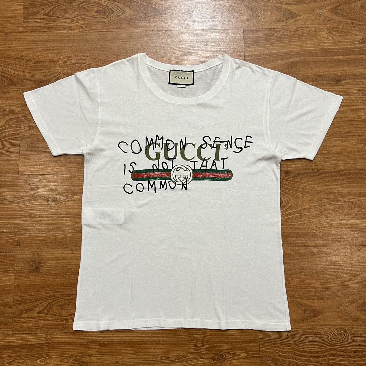 image of Gucci Coco Capitan “Common Sense Is Not That Common” Logo in White, Men's (Size Small)