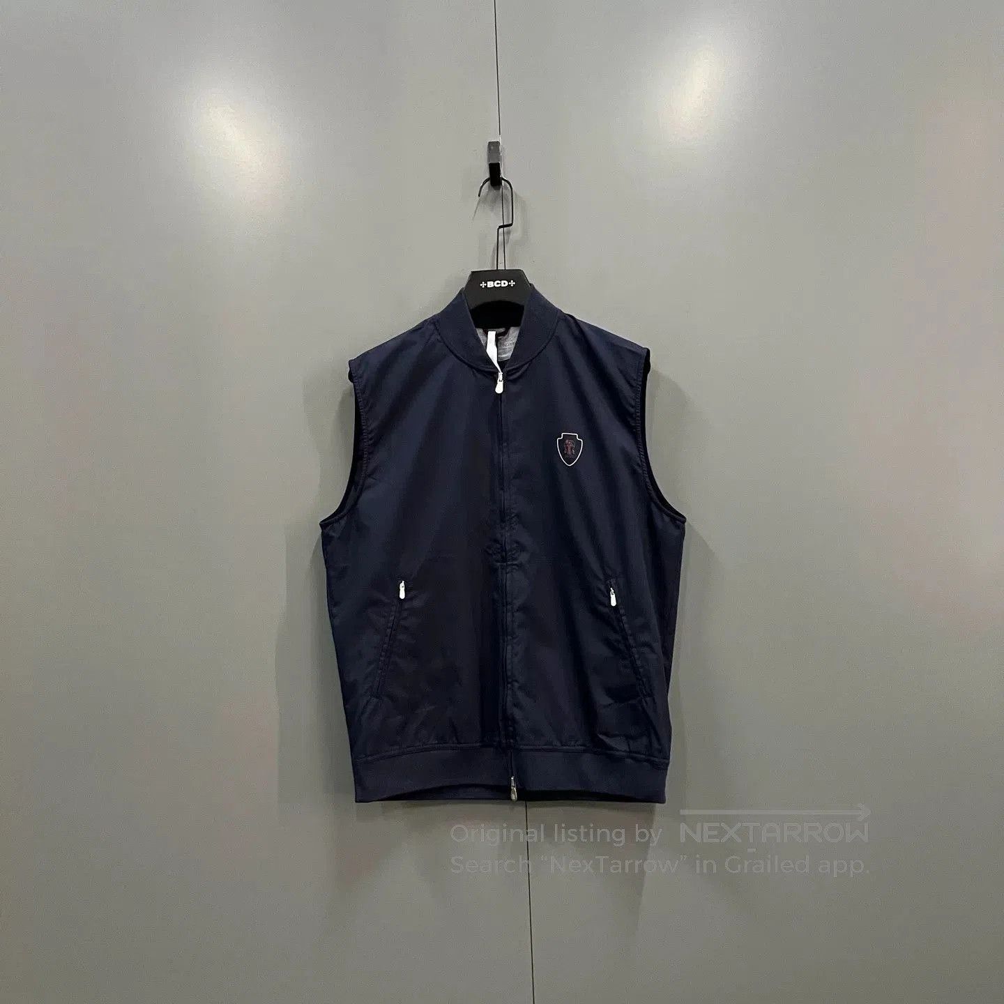 brunello cucinelli sleeveless vest with logo.