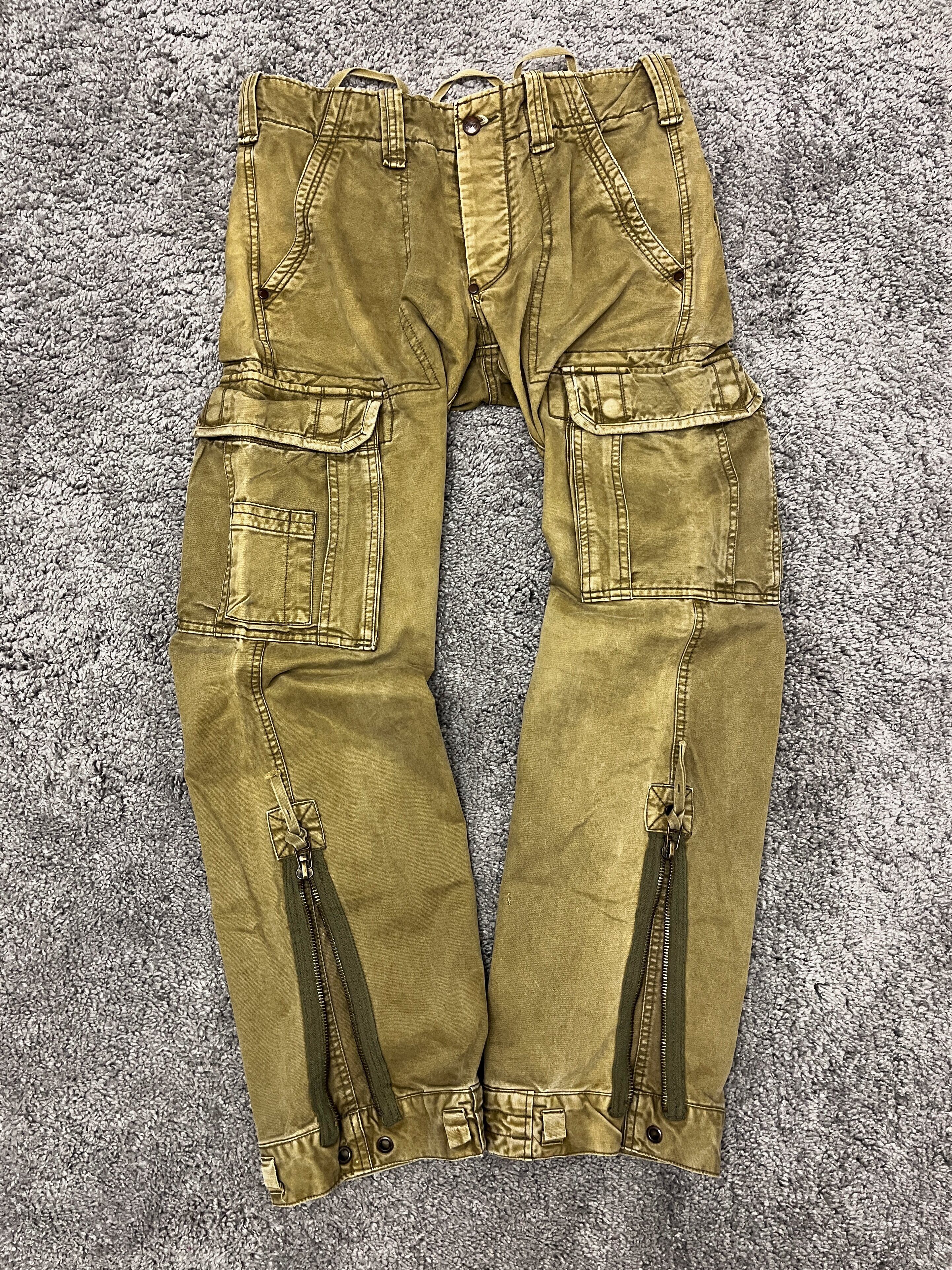 image of Archival Clothing x Avant Garde Vintage Japanese Pants Bondage Cargo Big Pocket Jeans (Size 32)