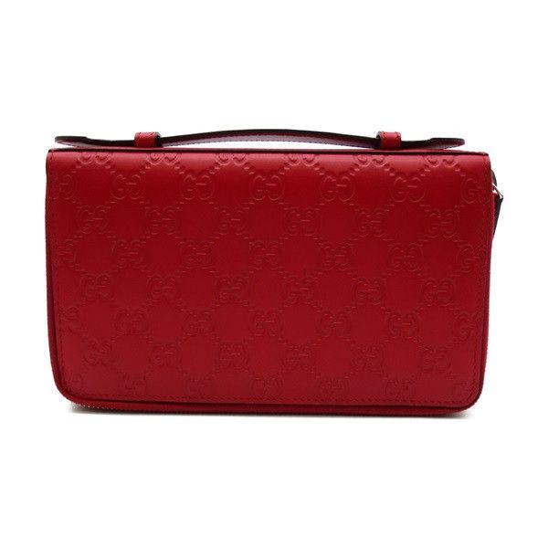 image of Gucci MicroGuccissima Double Zip Travel Wallet in Red, Women's