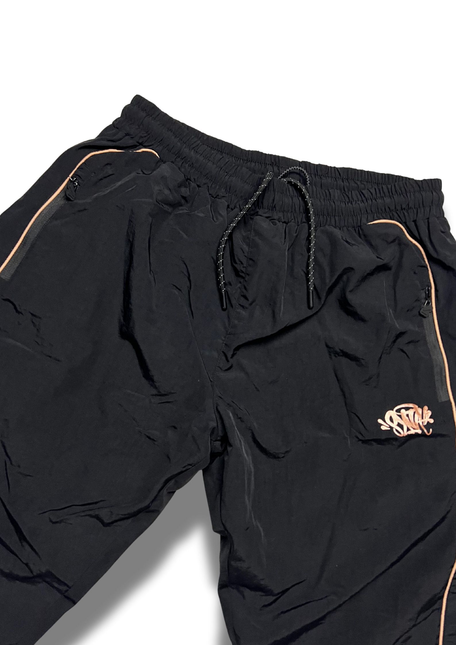 Syna World Syna World Shell Tracksuit “BLACK / GOLD” CHECK Description Size US S / EU 44-46 / 1 - 8 Thumbnail