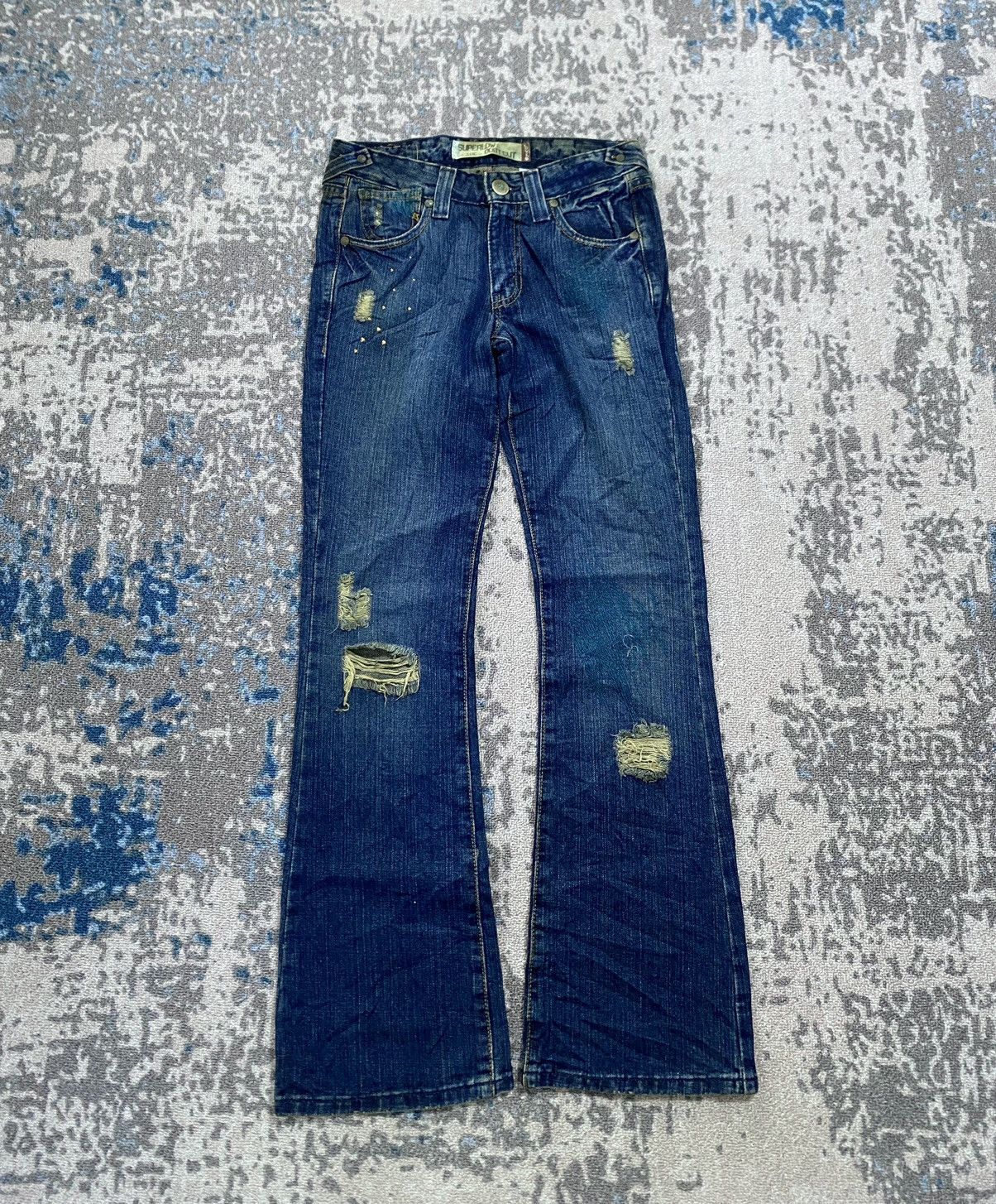 Levis 518 Superlow Boot Cut Distressed Jeans