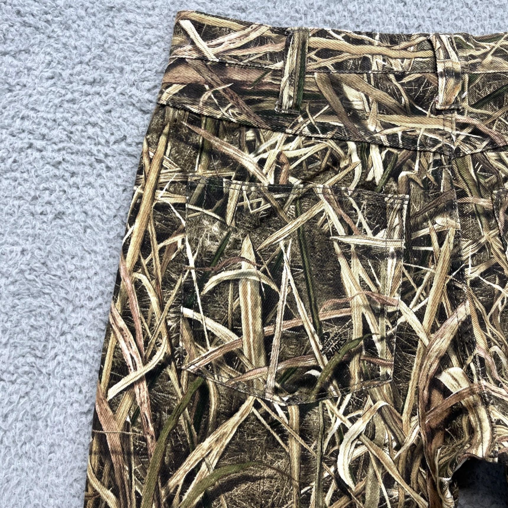 Vintage Mossy Oak Pants Mens 38x31 Shadow Grass Blades Camo Denim Hunting Outdoor Pants Mens 38 Shadow Grass Blades Camouflage 5-Pocket Denim Workwear Mens Size US 38 / EU 54 - 7 Thumbnail
