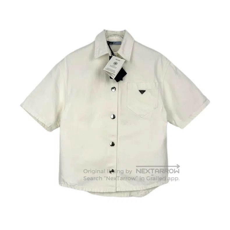 Prada Prada White denim destruction triangle short-sleeved shirt Size XS / US 0-2 / IT 36-38 - 1 Thumbnail