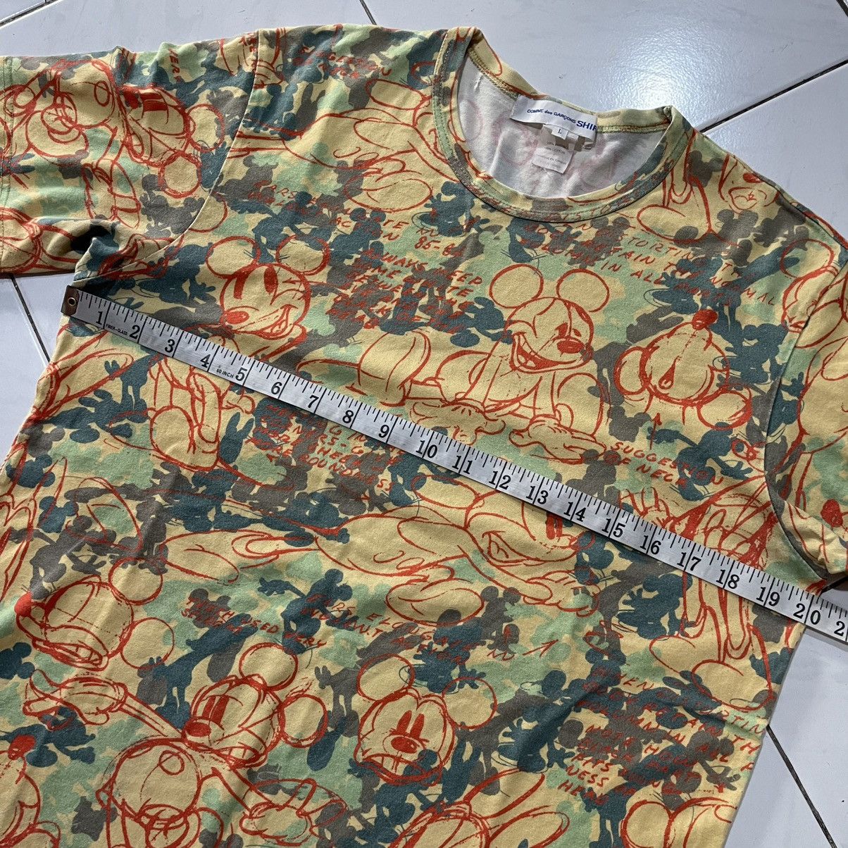 Comme des garcons disney all over print tee