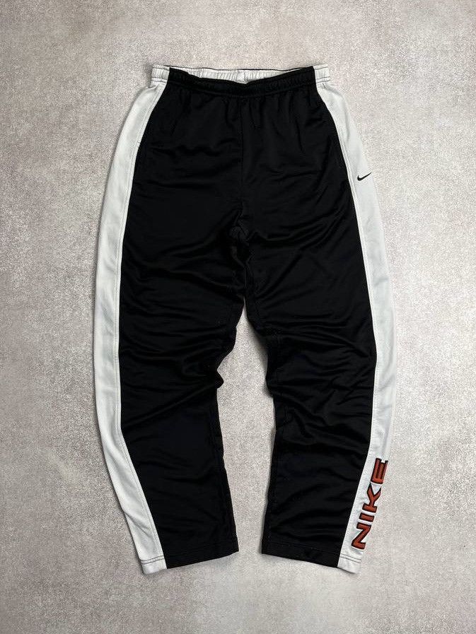 Nike × Vintage VINTAGE NIKE SWOOSH SPELLOUT BAGGY TRACK PANTS Y2K M Size US 34 / EU 50 - 1 Thumbnail