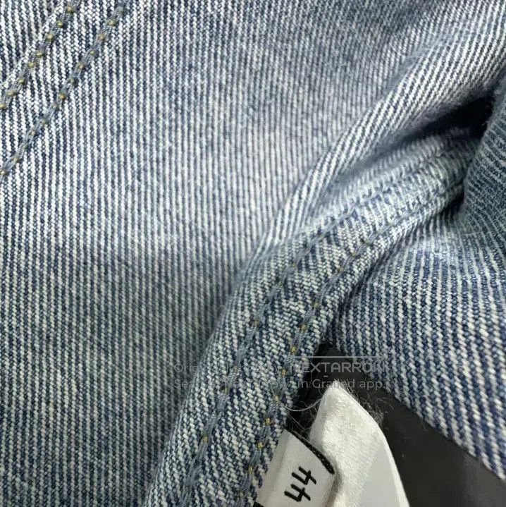 Balenciaga Denim Jacket with Pockets for All Genders.