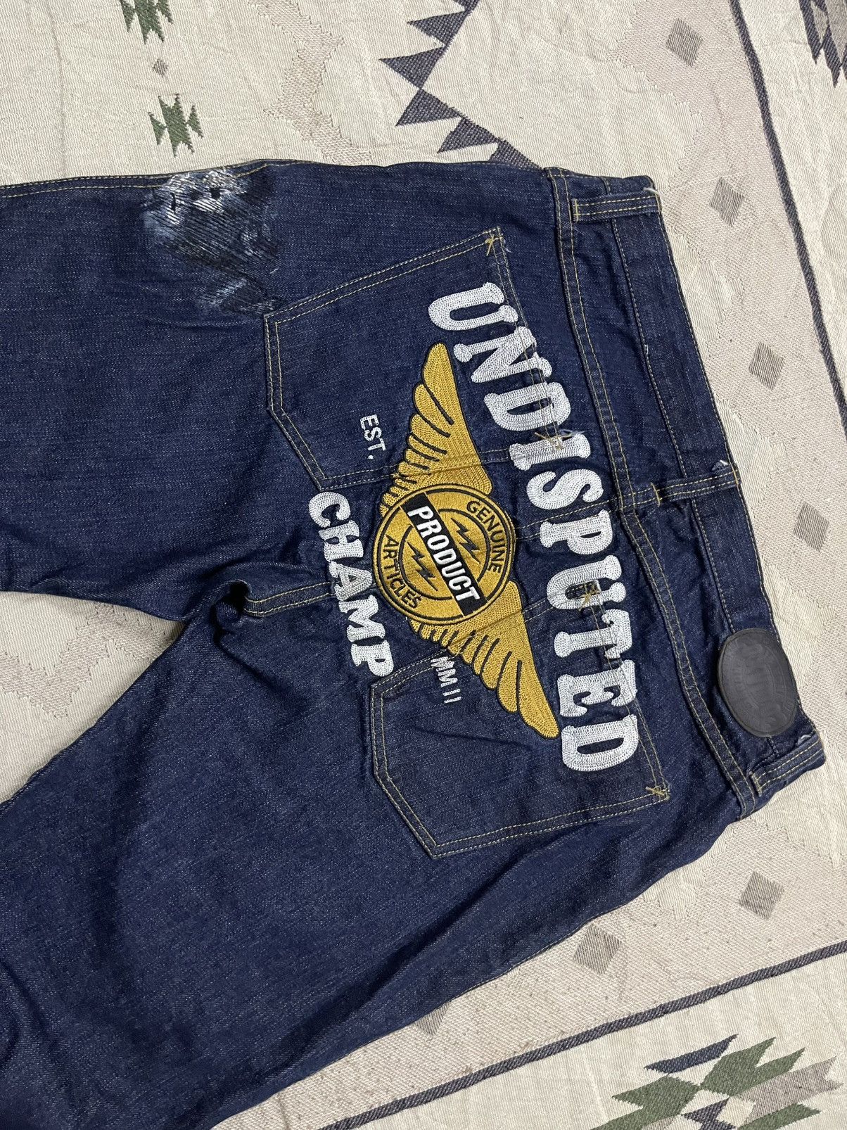 Beauty Beast 00s UNDISPUTED CHAMP GENUINE PRODUCT EMBROIDERED LOGO JEANS Size US 35 - 5 Thumbnail